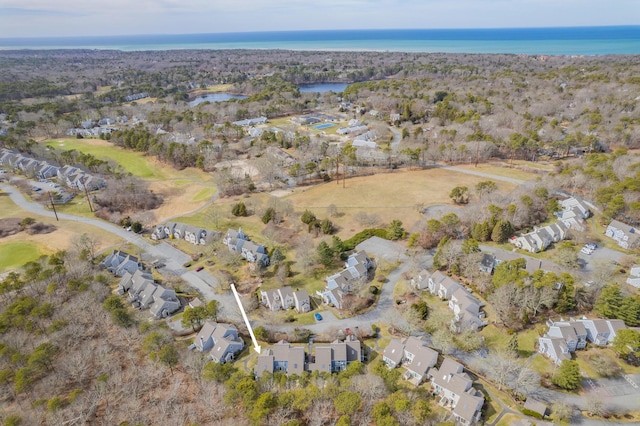 aerial view with a residential view and a water view