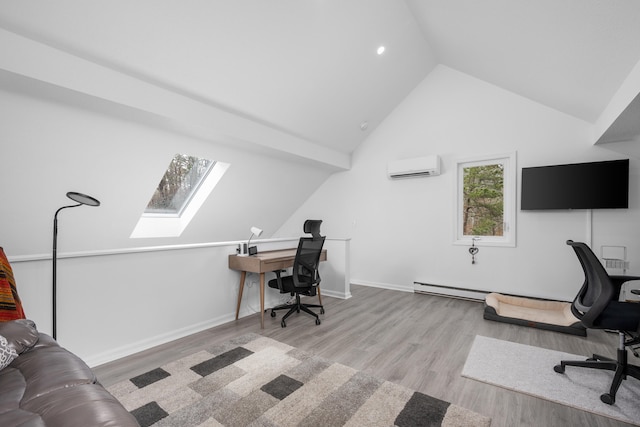 home office featuring baseboards, a wall mounted AC, wood finished floors, and a skylight