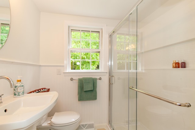 40 Highland Dr, Centerville, MA 02632 - full bathroom featuring a stall shower and a wainscoted wall