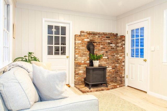 40 Highland Dr, Centerville, MA 02632 - living room featuring wood finished floors and a wood stove