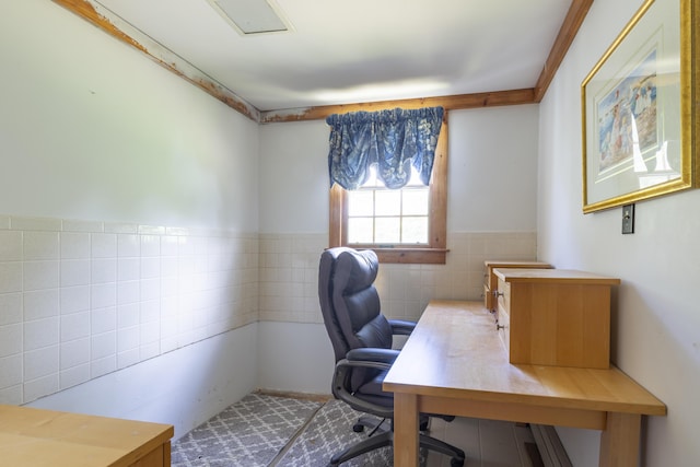 home office with tile walls