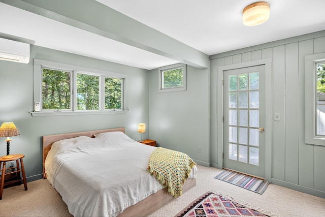 17 Gull Haven Ln, Wellfleet, MA 02667 - carpeted bedroom with baseboards and an AC wall unit