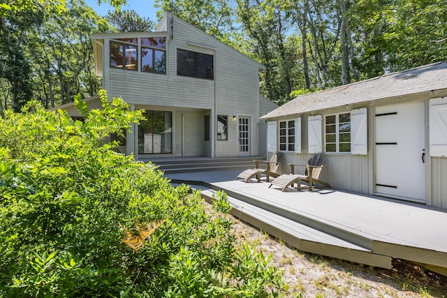 17 Gull Haven Ln, Wellfleet, MA 02667 - rear view of house with a deck and an outbuilding