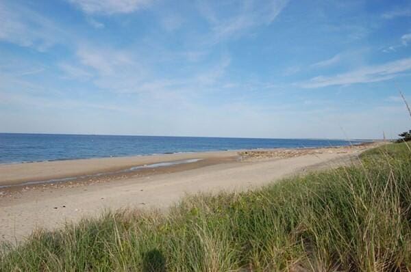 property view of water featuring a view of the beach