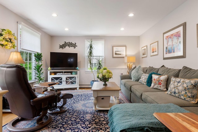 33 Rogers Rd, Brewster, MA 02631 - living room featuring wainscoting, baseboard heating, recessed lighting, and wood finished floors