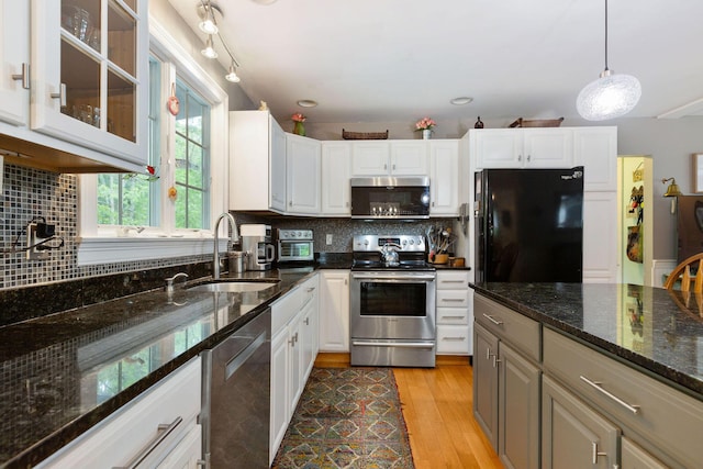 33 Rogers Rd, Brewster, MA 02631 - kitchen featuring stainless steel appliances, a sink, glass insert cabinets, tasteful backsplash, and recessed lighting
