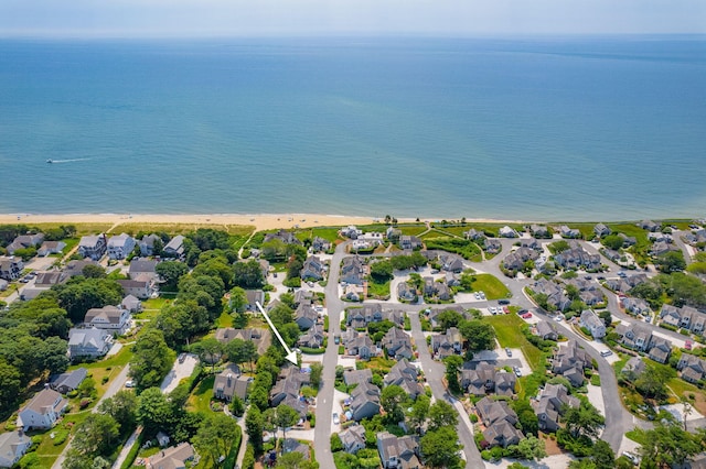 bird's eye view with a beach view and a water view