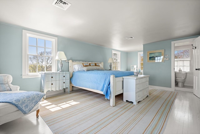 23 Oyster Pond Ln, Chatham, MA 02633 - bedroom featuring light wood-style flooring, multiple windows, and ornamental molding