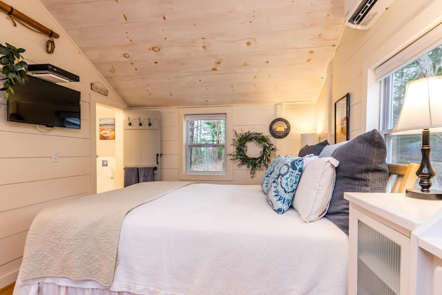 bedroom with vaulted ceiling and wood ceiling