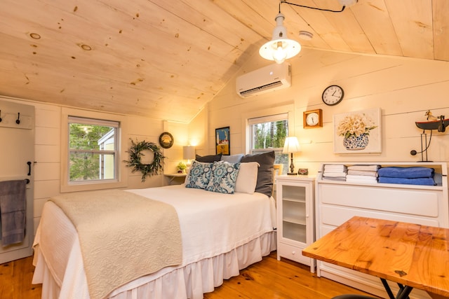 bedroom featuring wood ceiling, an AC wall unit, light wood finished floors, and lofted ceiling