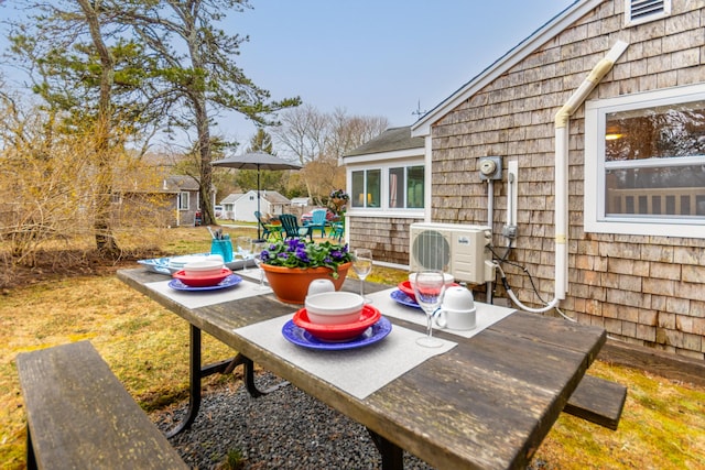 view of patio / terrace with ac unit and outdoor dining area