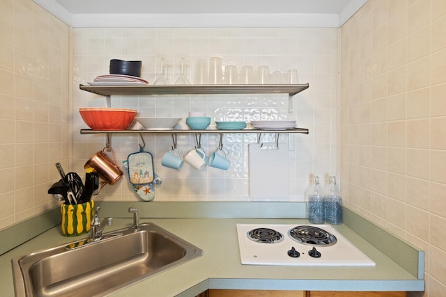 168 Shore Rd Unit 5, Truro, MA 02666 - kitchen featuring backsplash, a sink, and white electric stovetop