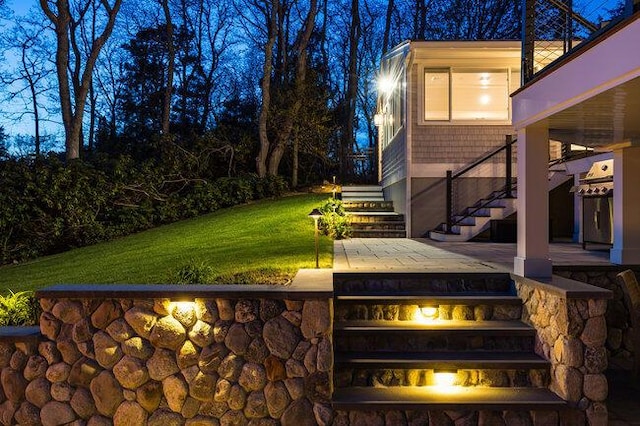 view of yard featuring stairs