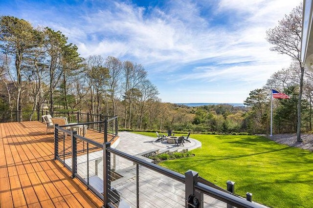 exterior space with an outdoor fire pit, a yard, a patio area, and outdoor dining area