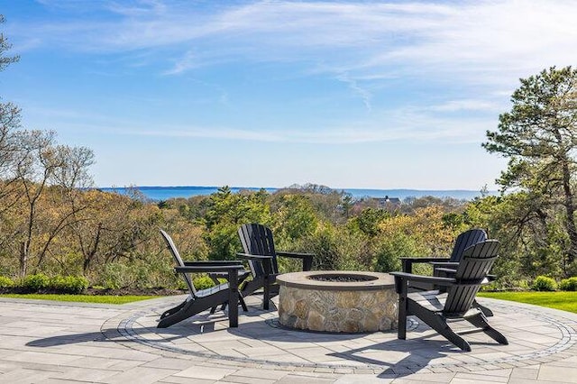 view of patio with a fire pit