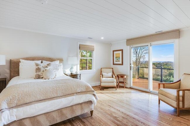 bedroom featuring wood ceiling, wood finished floors, access to exterior, baseboards, and recessed lighting