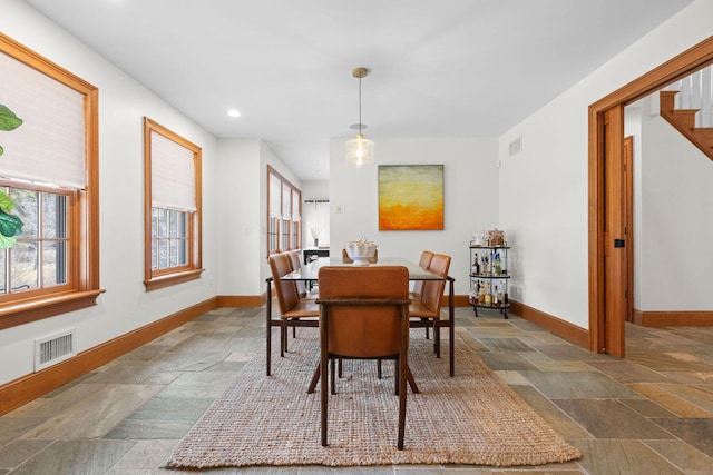40 Leilla Rich Dr, Wellfleet, MA 02667 - dining area with stone tile floors, baseboards, and recessed lighting
