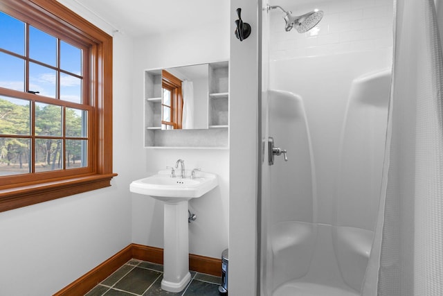 40 Leilla Rich Dr, Wellfleet, MA 02667 - bathroom with a shower stall, tile patterned floors, and baseboards