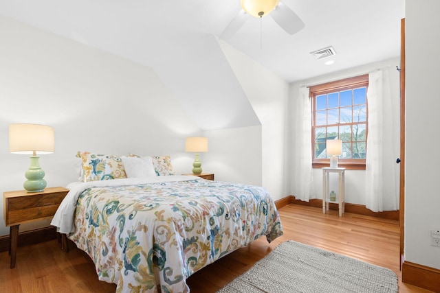 40 Leilla Rich Dr, Wellfleet, MA 02667 - bedroom with wood finished floors, baseboards, ceiling fan, and lofted ceiling