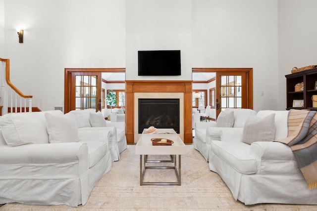 40 Leilla Rich Dr, Wellfleet, MA 02667 - living room with a high ceiling and a glass covered fireplace