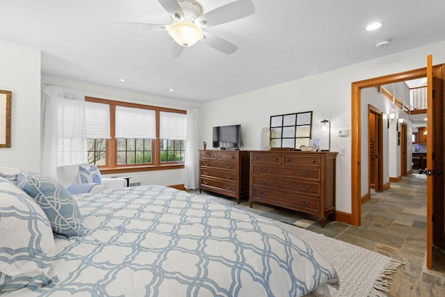 40 Leilla Rich Dr, Wellfleet, MA 02667 - bedroom with stone tile floors, baseboards, recessed lighting, and a ceiling fan
