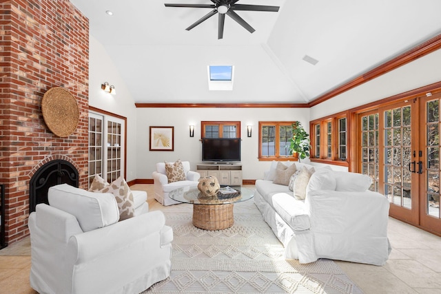 40 Leilla Rich Dr, Wellfleet, MA 02667 - living room featuring french doors, plenty of natural light, ceiling fan, high vaulted ceiling, and a brick fireplace