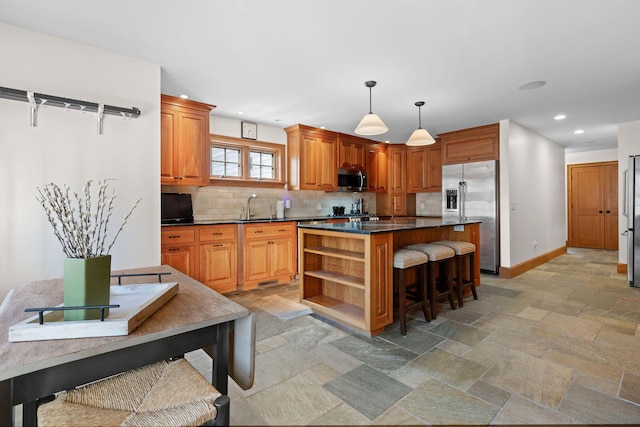 40 Leilla Rich Dr, Wellfleet, MA 02667 - kitchen with appliances with stainless steel finishes, stone tile flooring, open shelves, dark countertops, and recessed lighting