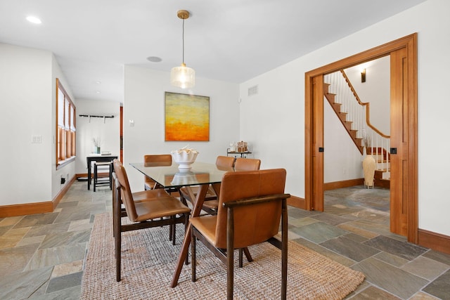 40 Leilla Rich Dr, Wellfleet, MA 02667 - dining room with stone tile flooring, baseboards, stairway, and recessed lighting