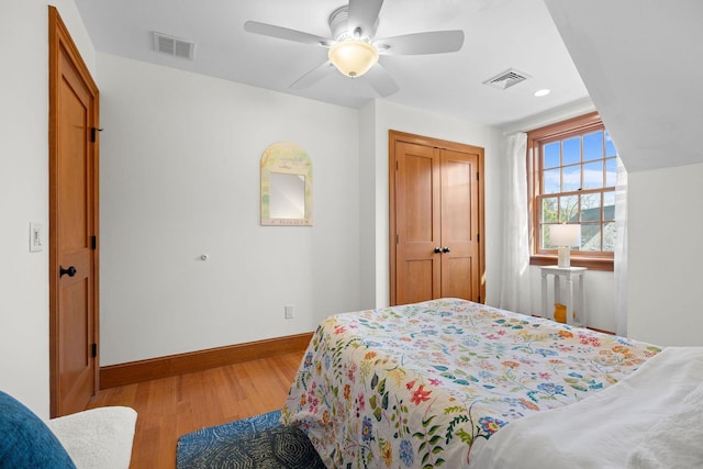 40 Leilla Rich Dr, Wellfleet, MA 02667 - bedroom with wood finished floors, baseboards, a closet, and a ceiling fan