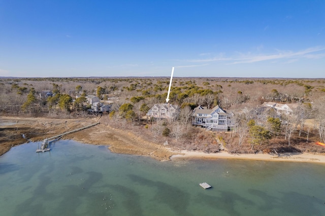 bird's eye view featuring a view of the beach and a water view