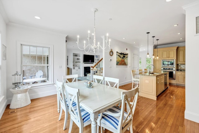 780 Craigville Beach Rd Unit 10, Centerville, MA 02632 - dining area featuring light wood-style flooring, recessed lighting, a chandelier, and ornamental molding