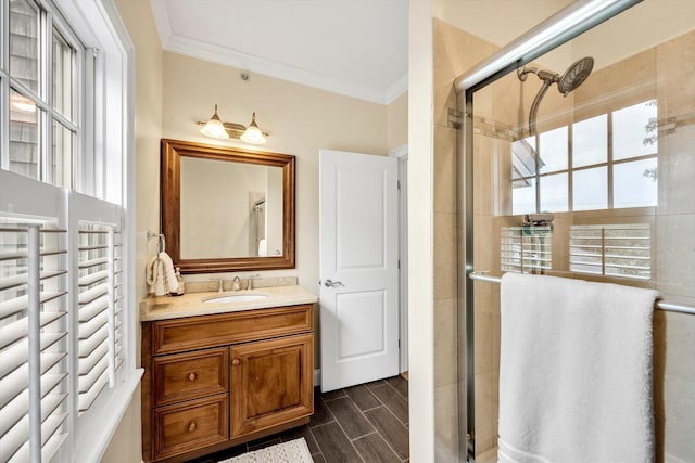 780 Craigville Beach Rd Unit 10, Centerville, MA 02632 - bathroom featuring crown molding, a shower stall, vanity, and wood tiled floors