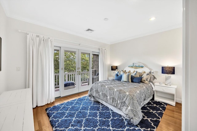 780 Craigville Beach Rd Unit 10, Centerville, MA 02632 - bedroom featuring french doors, access to exterior, crown molding, and wood finished floors