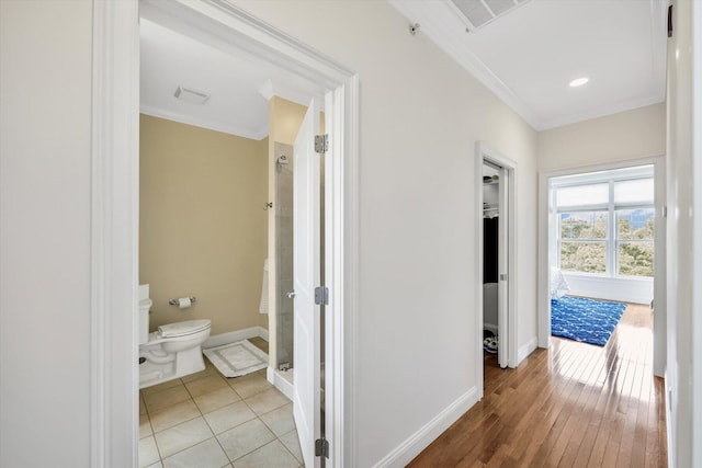 780 Craigville Beach Rd Unit 10, Centerville, MA 02632 - corridor featuring ornamental molding and light wood-style flooring