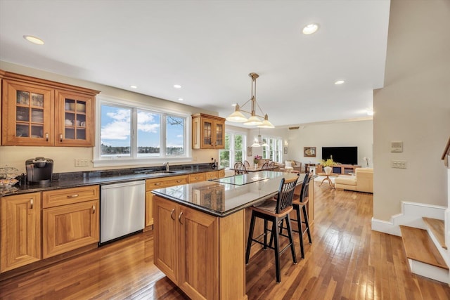 86 Summersea Rd, Mashpee, MA 02649 - kitchen featuring a kitchen island, dishwasher, a sink, open floor plan, and a kitchen breakfast bar