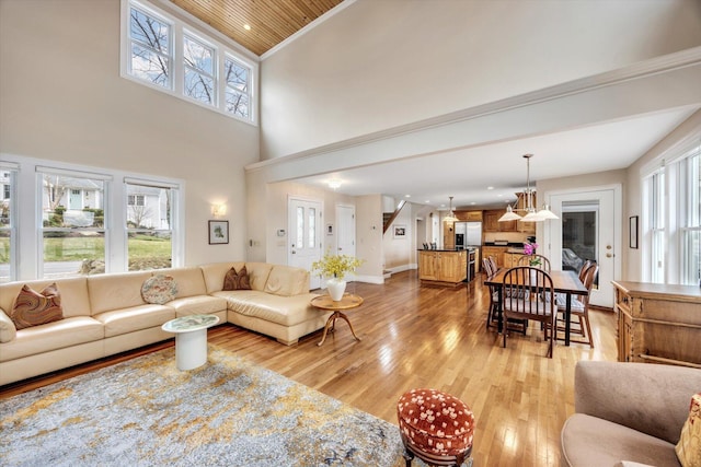 86 Summersea Rd, Mashpee, MA 02649 - living area with recessed lighting, a high ceiling, light wood-style flooring, baseboards, and ornamental molding