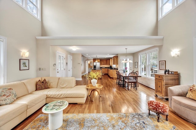 86 Summersea Rd, Mashpee, MA 02649 - living room featuring a towering ceiling and light wood finished floors