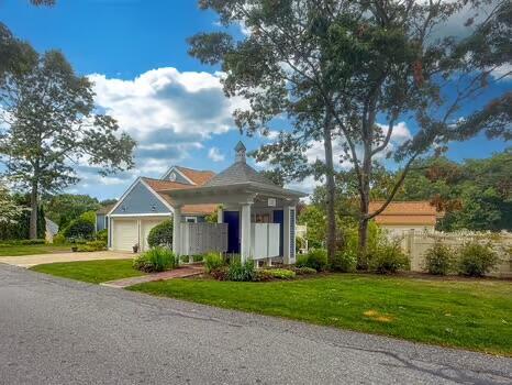 3 Mayfair Ct, Mashpee, MA 02649 - view of front of house featuring a garage and driveway