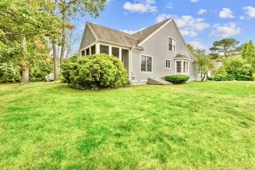 3 Mayfair Ct, Mashpee, MA 02649 - rear view of property with a yard