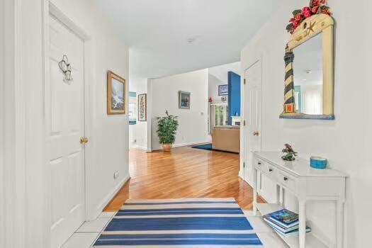 3 Mayfair Ct, Mashpee, MA 02649 - corridor featuring light wood finished floors and baseboards