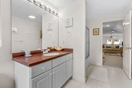 3 Mayfair Ct, Mashpee, MA 02649 - full bath with vanity, ceiling fan, tile patterned flooring, and a shower with shower door