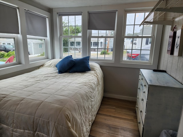 bedroom featuring dark wood-type flooring