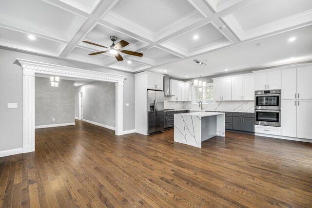 staircase featuring baseboards