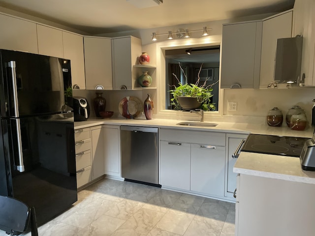 104 Chestnut Cir, Brewster, MA 02631 - kitchen with freestanding refrigerator, dishwasher, light countertops, light marble finish flooring, and open shelves