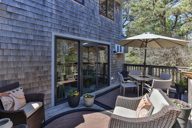 104 Chestnut Cir, Brewster, MA 02631 - wooden terrace featuring outdoor dining area