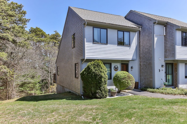 104 Chestnut Cir, Brewster, MA 02631 - townhome / multi-family property featuring a front lawn