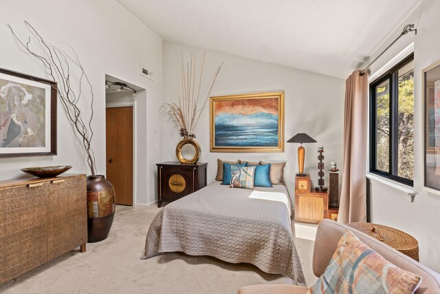 104 Chestnut Cir, Brewster, MA 02631 - bedroom with vaulted ceiling and carpet flooring