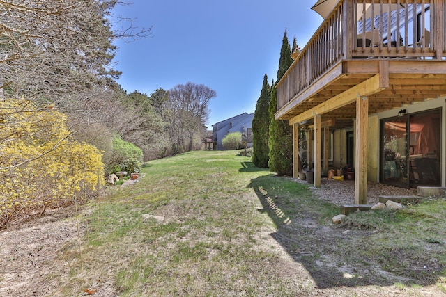 104 Chestnut Cir, Brewster, MA 02631 - view of green lawn featuring a wooden deck