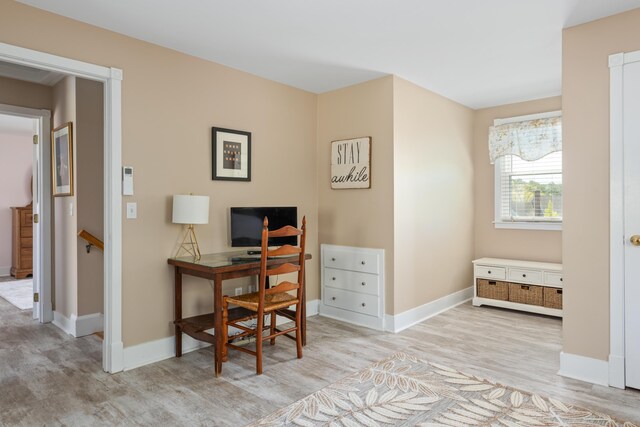 office space with light hardwood / wood-style floors