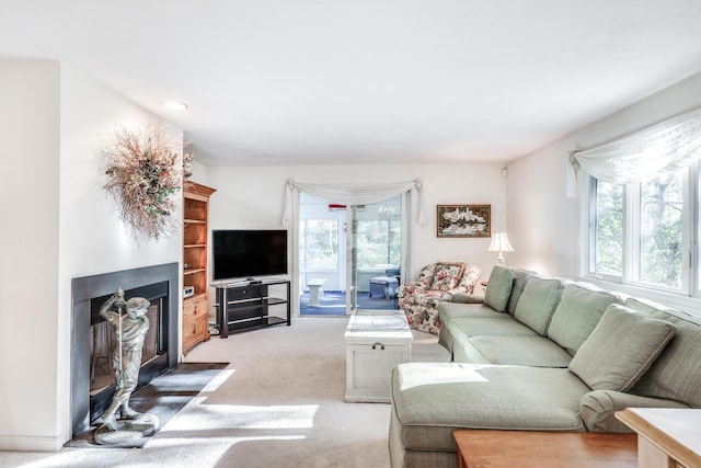 living room featuring light colored carpet